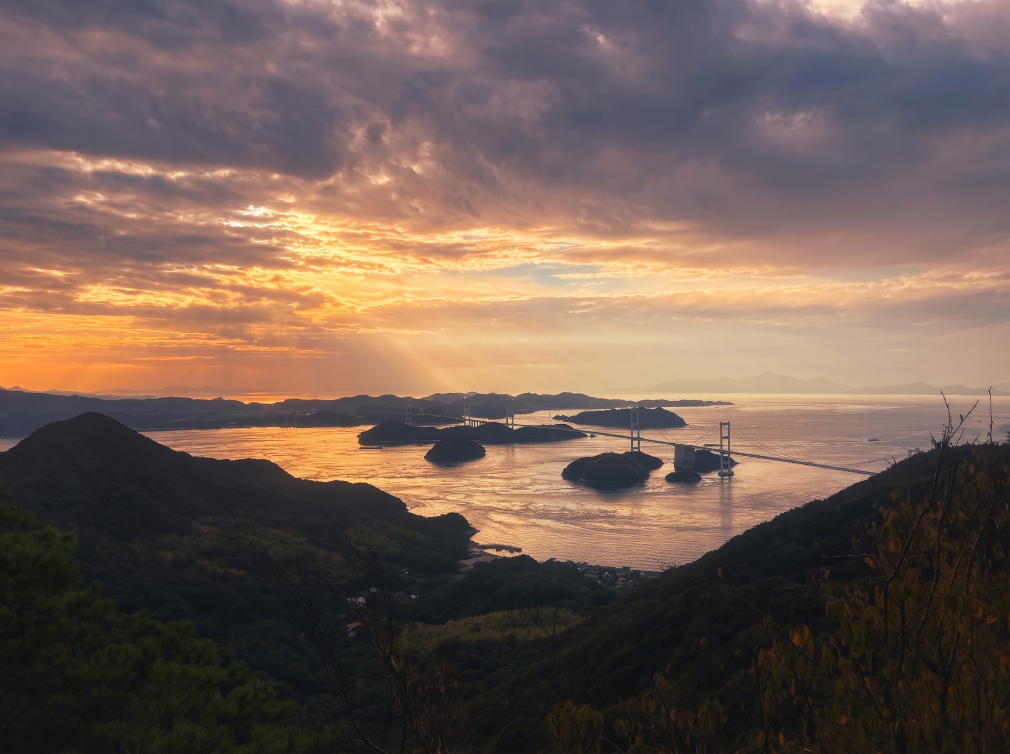 Sunset over islands and sea — a regional image, not a view from either house